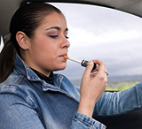 Fumar mientras se conduce